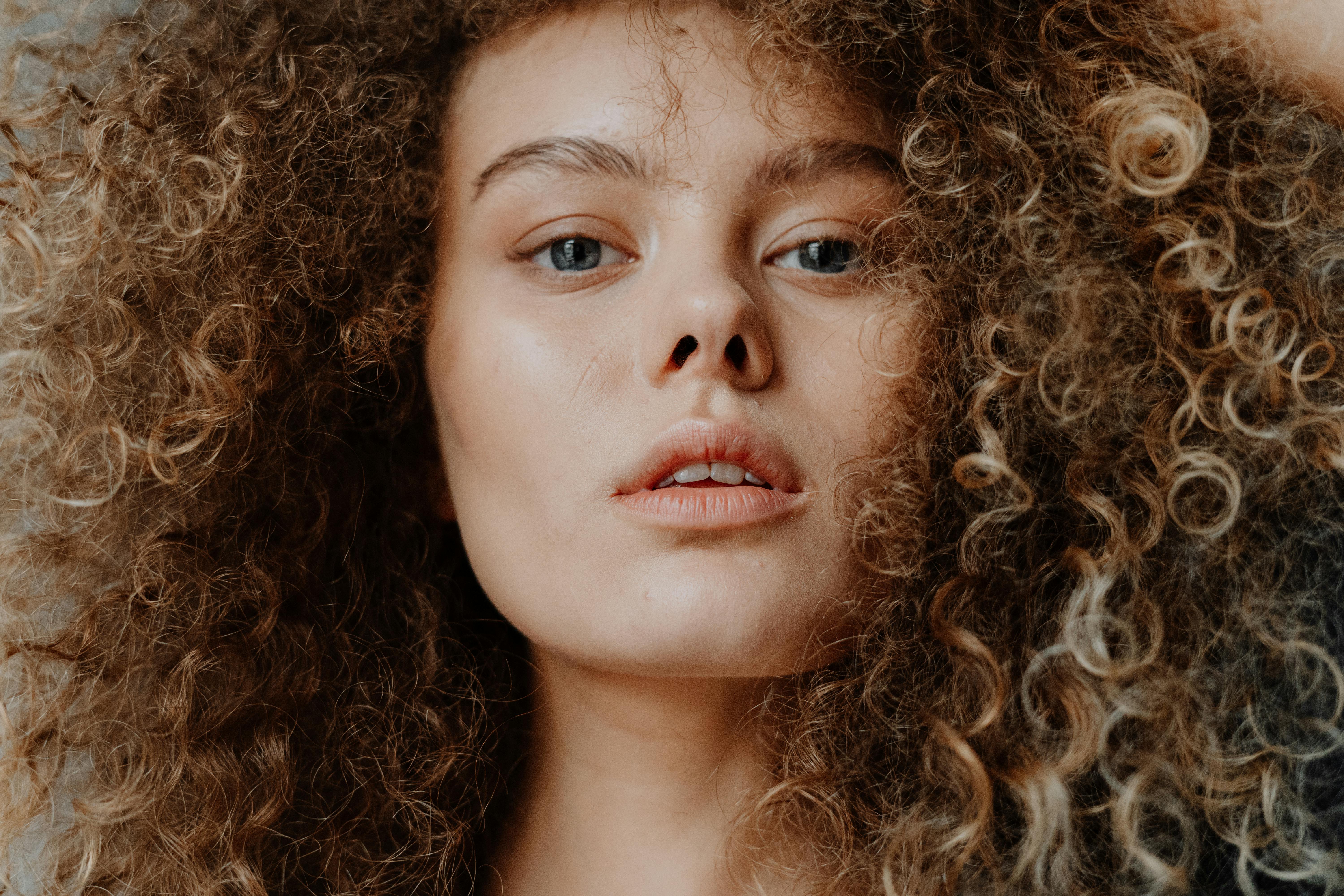 A woman with curly hair